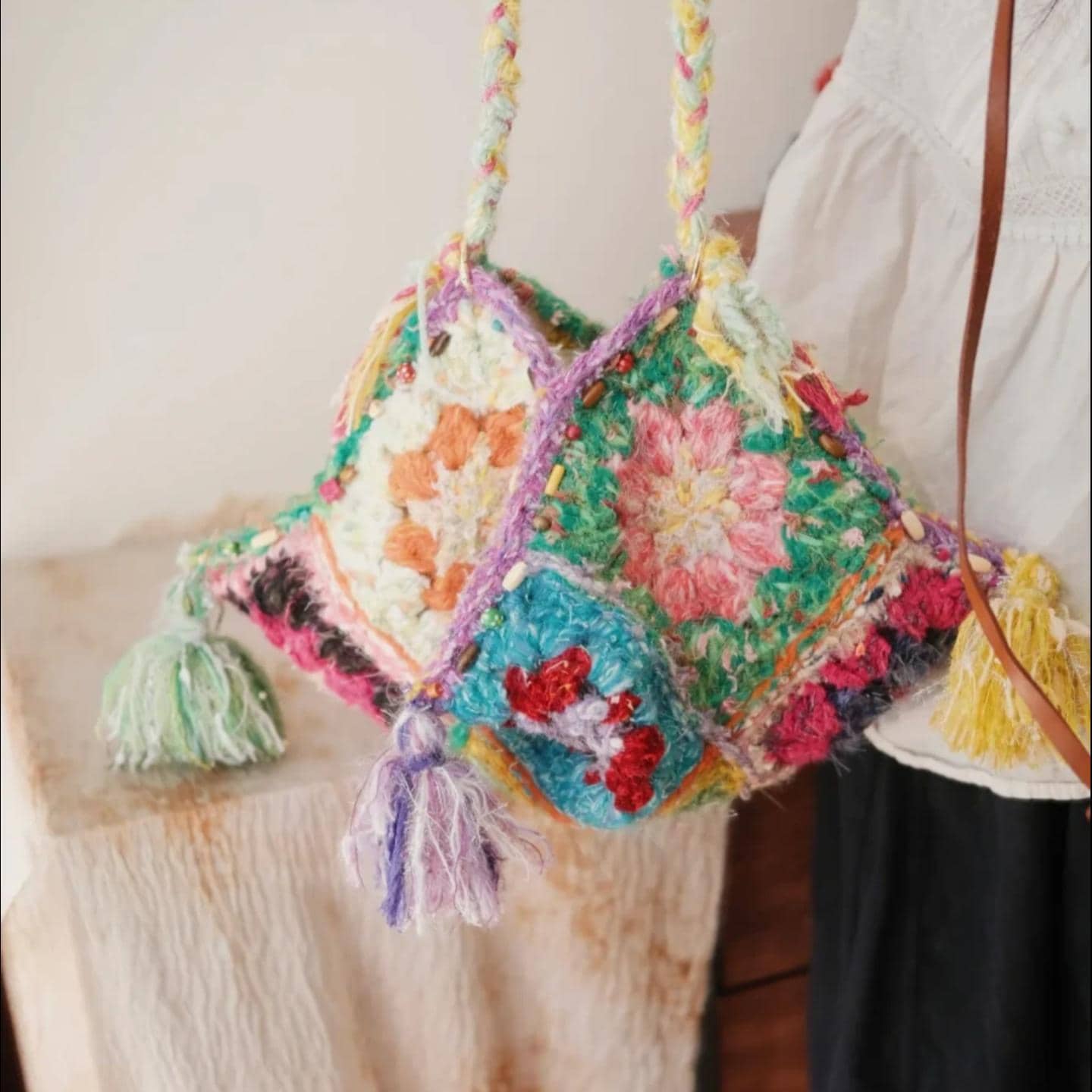 Handmade Boho Dumpling Bag, Colorful Textured Crochet Purse, Chunky Granny Square Tote with Tassels, Artisan Gift for Her